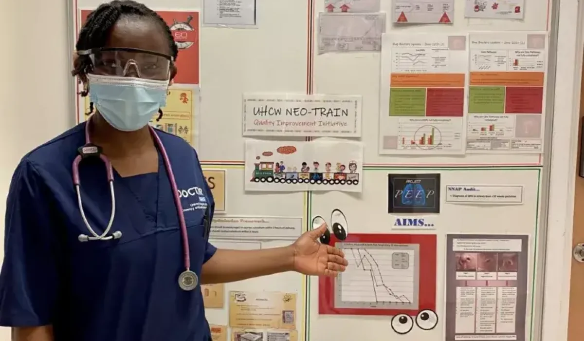 A medical professional infront of breathign circuit diagrams and information A medical professional infront of breathign circuit diagrams and information